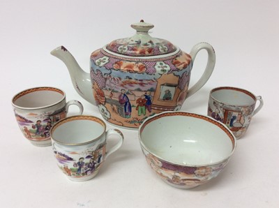 Lot 29 - A New Hall 'Boy at the Window' teapot and cover, and three similar coffee cups, a bowl and a tea bowl