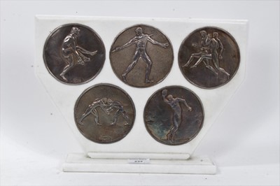 Lot 232 - Five silver Greek roundels in frame mount