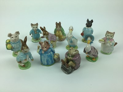 Lot 181 - Eleven Beswick Beatrix Potter figures - Ribby, Mr Jackson, Tom Kitten, Little Pig Robinson, Mr Benjamin Bunny and Peter Rabbit, Jemima Puddleduck, Aunt Pettitoes, Peter Rabbit, Samuel Whiskers, Pig...