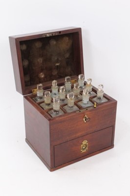 Lot 457 - Georgian mahogany apothecary box bearing label for Hume, Chemist, 108 Long Acre, London, containing twelve glass bottles and stoppers, fitted drawer with glass pestle and mortar and two glass vesse...