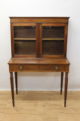 Lot 1457 - Good quality 19th century Sheraton revival vitrine cabinet on stand, the twin glazed doors enclosing a single shelf, with fitted drawer below containing a leather lined writing slide, on turned and...