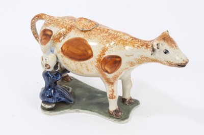 Lot 5 - Prattware cow creamer and cover, c.1800