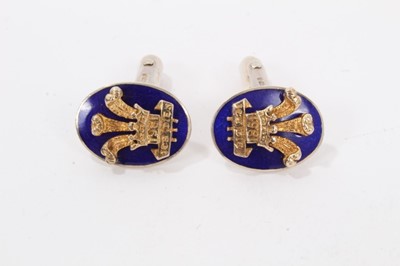 Lot 19 - The wedding of The Prince and Princess of Wales 1981 , pair of yellow metal,silver and enamel cufflinks decorated with POW feather crest and date 1981 with folding bar mounts- presented to Gentleme...