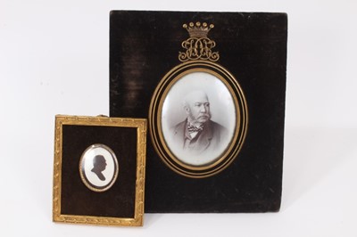 Lot 27 - Victorian memorial portrait photograph of an Earl in black enamel and gilt metal oval mount with Earls coronet and JD monogram cresting on velvet ground with gilt metal easel back, 18.6 x 16 cm