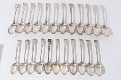 Lot 160 - Set of twelve Georgian silver Old English pattern feather edge table spoons (London 1778) together with eleven matching dessert spoons, (marks rubbed)