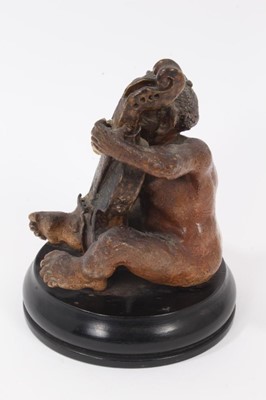 Lot 12 - Martin Brothers salt glazed pottery sculpture of a grotesque figure playing a cello