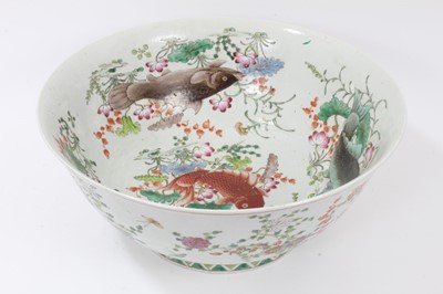 Lot 121 - Large 20th century Chinese porcelain bowl, the inside painted with fish swimming amongst weeds and flowers, the outside with flowers, six-character Kangxi mark in iron red to base, 41cm diameter