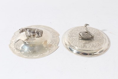 Lot 66 - Victorian silver butter dish cover with Cow finial together with another with a Swan finial