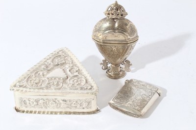 Lot 87 - Victorian silver trinket box of triangular form with embossed decoration (London 1885), together with a silver vesta case and a 19th century Continental white metal