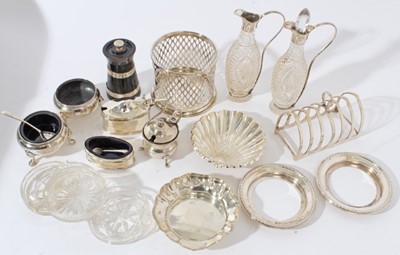 Lot 100 - George V six division toast rack (Birmingham 1932), maker Adie Brothers, together with a pair of Victorian silver salts of cauldron form (London 1858)