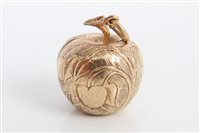 Lot 3228 - Gold (9ct) novelty Adam & Eve charm in the...