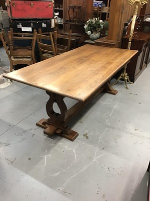 Lot 195 - Good quality carved oak dining room suite comprising refectory table on pierced end standards 211 x 103 cm, eight chairs with tapestry seats, oak sideboard with armorial lion decoration116 cm