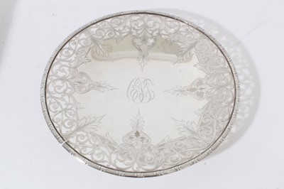 Lot 154 - American Sterling silver circular dish with foliate pierced border and central engraved monogram, stamped to underside Shreve, Crump & Low Co., 30.5cm diameter, 18ozs