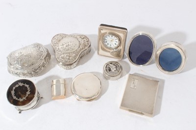 Lot 145 - George V silver trinket box of circular form, tortoiseshell lid inset with silver, raised on three feet, (Birmingham 1913) together with a late 19th century Dutch silver snuff box
