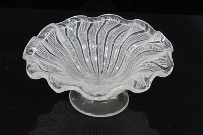 Lot 154 - Small continental, probably Venetian, footed latticino glass dish with wavy rim, rough pontil mark to base, 10cm diameter