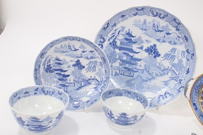 Lot 147 - A Miles Mason blue printed teapot stand, impressed mark, and other blue printed items