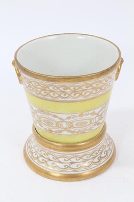 Lot 137 - A Coalport yellow ground jardinière and stand, circa 1800-15