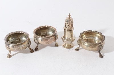 Lot 139 - Pair of George II silver salts of cauldron form, raised on three pad feet, (London 1751), together with a George III silver