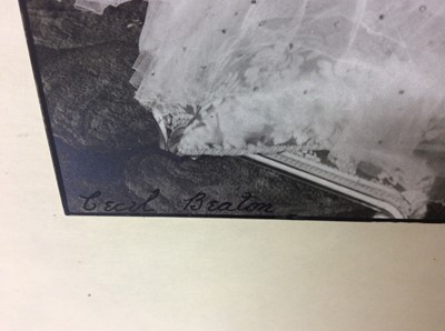 Lot 54 - H.M. Queen Elizabeth , fine 1939 Cecil Beaton black and white portrait photograph - The Queen wearing a beautiful sequinned ball gown and jewels with a painted classical garden scene backdrop, moun...