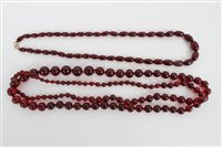 Lot 3232 - Two simulated cherry amber bead necklaces