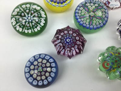 Lot 613 - Eight John Deacons art glass paperweights (8)