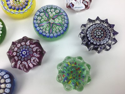 Lot 613 - Eight John Deacons art glass paperweights (8)