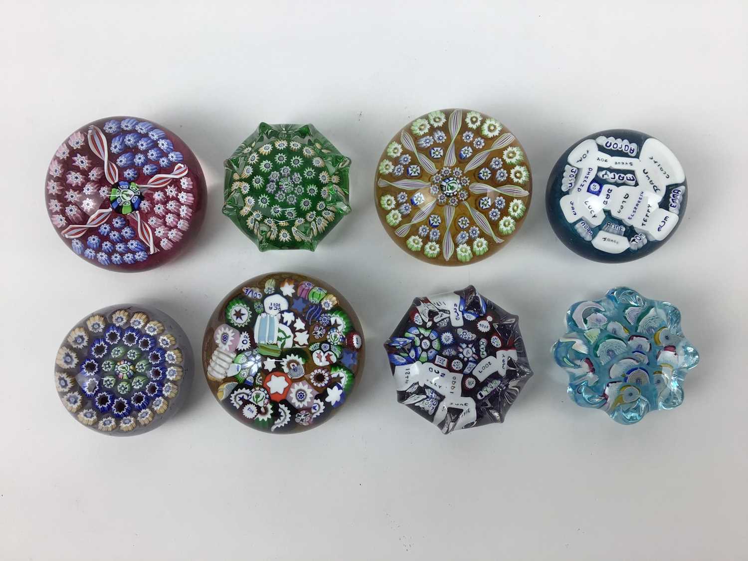Lot 607 - Eight John Deacons art glass paperweights (8)
