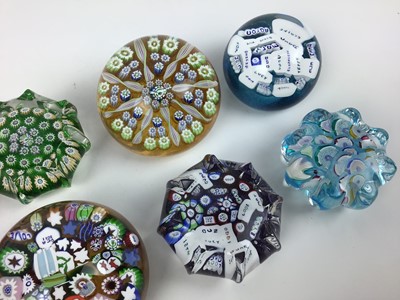Lot 607 - Eight John Deacons art glass paperweights (8)