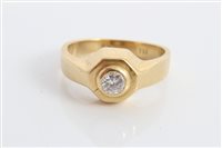 Lot 3235 - Gold (stamped 750) diamond single stone ring,...