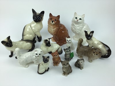 Lot 658 - Fourteen Beswick cats