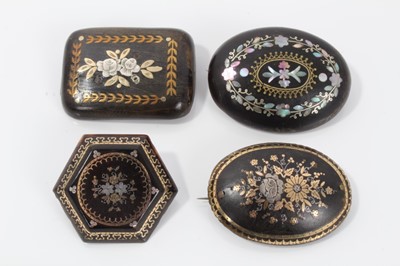 Lot 7 - Group of four 19th century tortoishell piqué work brooches various, with floral decoration. 35mm-45mm