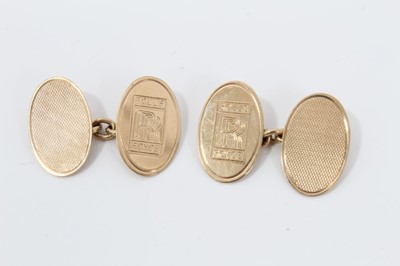 Lot 394 - Pair Gentleman's 9ct gold Rolls-Royce oval cufflinks with engraved logos and engine turned decoration.