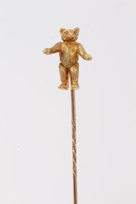 Lot 392 - Rare early 20th century gold teddy bear stickpin, the bear with long limbs and beautifully detailed with spiral twist pin fitting - probably a special commission .