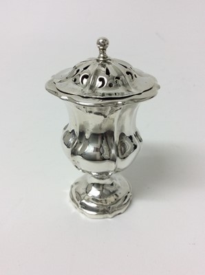 Lot 175 - Good quality William IV silver pepperette, of shaped campagna form, pierced cover and shaped pedestal foot, (London 1831), makers mark indistinct, 9cm high, 2ozs