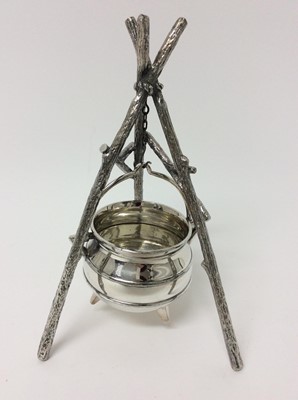 Lot 180 - Unusual Victorian Silver plated novelty dish in the form of a cauldron, with swing handle suspended on a stand modelled as a tripod made of branches, underside of cauldron with plater's marks, 24.5...