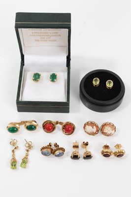 Lot 46 - Nine pairs of gold earrings to include a pair of emerald single stone stud earrings in 18ct gold setting, two pairs of peridot earrings and six other pairs of gem-set earrings in 9ct gold setting