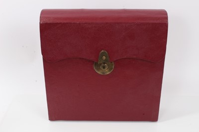 Lot 773 - Good quality Victorian red Morocco leather travelling writing case of book-shaped form with fold out writing slope, pen, ink,  stationary and correspondence compartments .30.5 cm high and wide, 8cm...