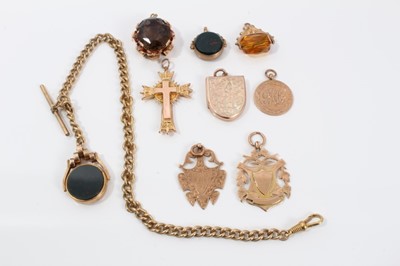 Lot 53 - Edwardian gold and agate revolving fob on plated chain and eight other gold mounted fobs