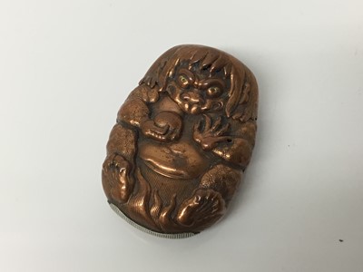 Lot 306 - Japanese Meiji period brass vesta case in the form of a Demon, 5cm x 4cm