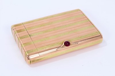 Lot 2 - Fine Imperial Russian Faberge two colour striped gold cigarette case of retangular form with concealed vesta case to one end with striking plate to the interior of the lid, cabochon ruby thumb piec...