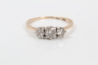 Lot 249 - Diamond three stone ring with three round brilliant cut diamonds in claw setting on 18ct yellow gold shank. Estimated total diamond weight approximately 0.50cts, ring size L.