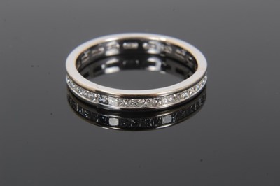 Lot 571 - Diamond full band eternity ring with a full band of princess cut diamonds in 18ct white gold channel setting. Estimated total diamond weight approximately 0.50cts. Hallmarked 18ct. Ring size L.