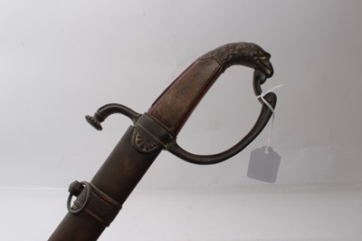 Lot 305 - Rare Mid-19th century American presentation sword with brass eagles head pommel , diced walnut grips, D- shaped guard, blued and gilt curved fullered blade decorated with military trophies and pane...