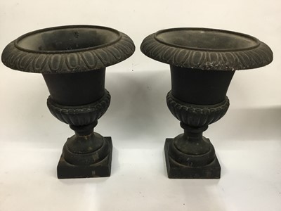Lot 255 - Pair of Victorian-style cast iron campagna shaped urns