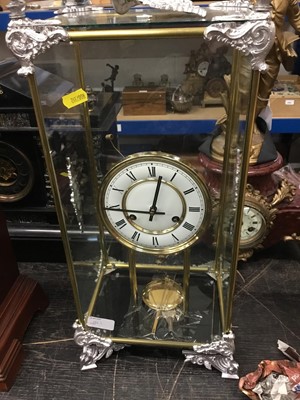 Lot 1885 - Antique slate mantel clock with a figure of Father Time, together with a slate and marble mantel clock and a modern glass cased clock (3)