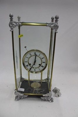 Lot 1885 - Antique slate mantel clock with a figure of Father Time, together with a slate and marble mantel clock and a modern glass cased clock (3)
