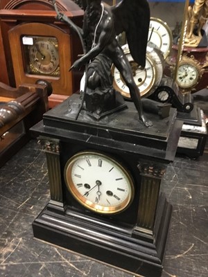 Lot 1885 - Antique slate mantel clock with a figure of Father Time, together with a slate and marble mantel clock and a modern glass cased clock (3)