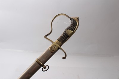 Lot 319 - First World War Turkish officers' sabre with plated stirrup hilt and star and crescent langet , plated blade with etched Turkish arms and military trophies in nickel plated scabbard