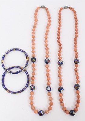 Lot 10 - Two Chinese pink hard stone and cloisonné bead necklaces, plus two cloisonné bangles