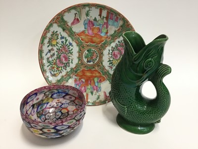 Lot 129 - Cantonese famille rose charger, fish gluggle jug and a glass millefiori bowl